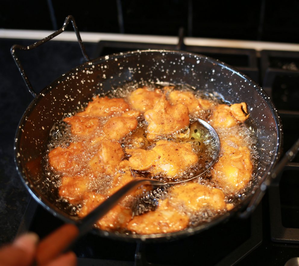 pakoras being fried